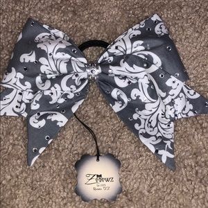 Gray and white cheer bow